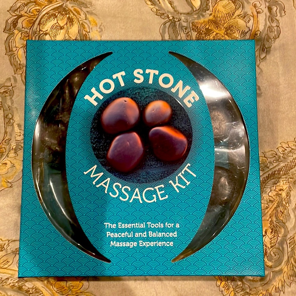 New, never used, still sealed in box!! Hot stone massage kit